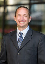 Headshot of Chris Hus