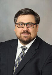 Headshot of Corey Johnson