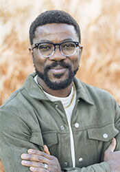 Headshot of Segun Kolade